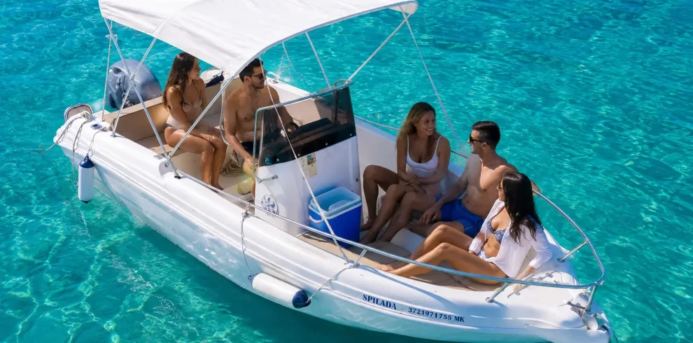 Boat rental in Ksamil departing from Butrint with tourists exploring the Albanian Riviera