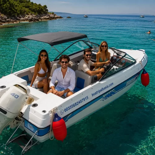 Small self drive boat on a crystal clear beach in Vlore Albania